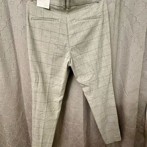 Women matching jacket & pant suit. Brand new with tags.